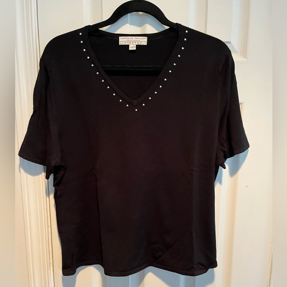 Carolyn Taylor black v-neck top with silver studs around the neck. Size …